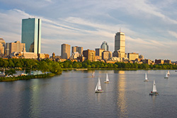 sunset on Back Bay and Boston skyline with Hancock Tower
