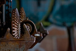 rusty clockwork gear and metal pieces