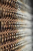 chain link fence with rust, perspective