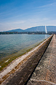 Geneva Jet d'Eau and Leman Lake in Switzerland from stone jetty