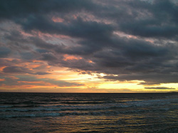 cloudy sunset on the sea with waves, Mediterranean Sea in South of France